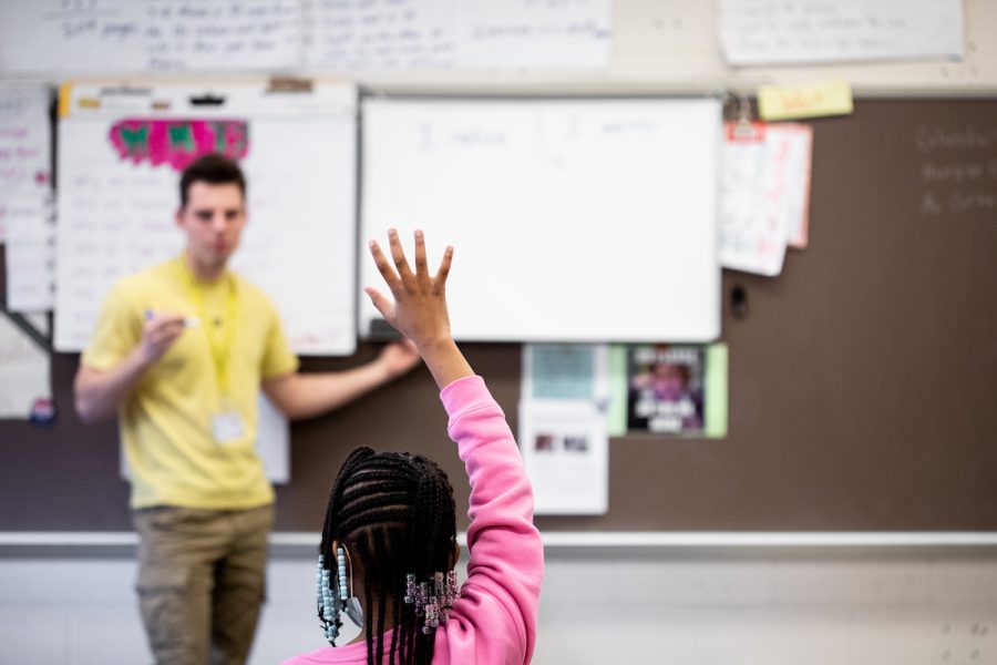 School of Education graduate teaching young students